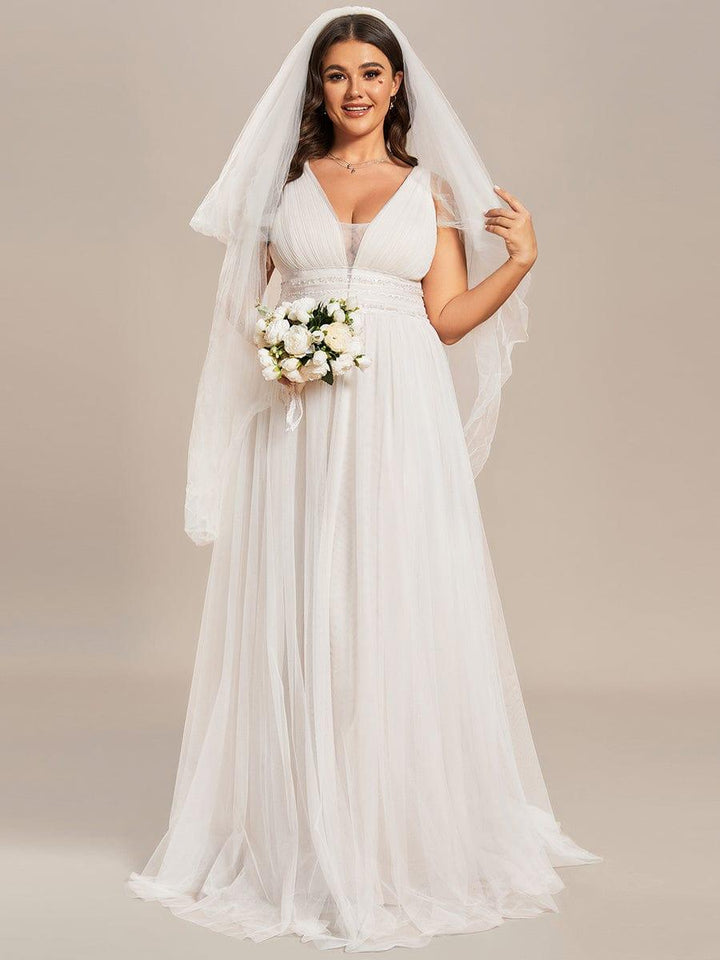 Women's V Neck Wedding Dress with Empire Waist and Flowing Maxi Skirt