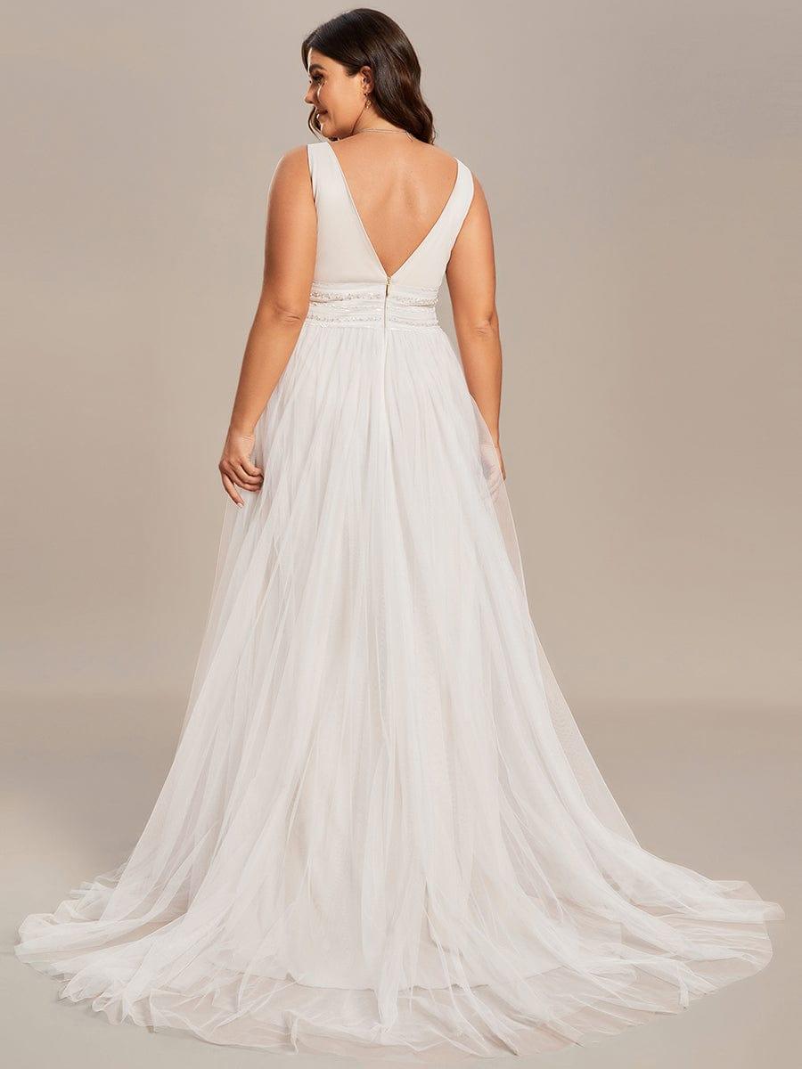 Women's V Neck Wedding Dress with Empire Waist and Flowing Maxi Skirt