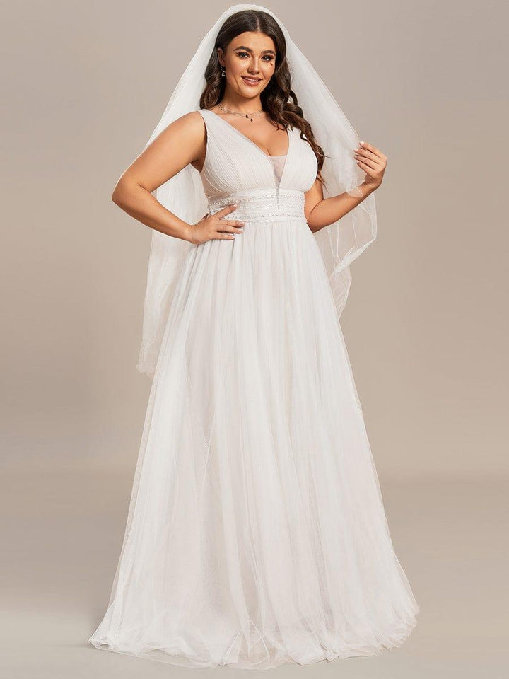 Women's V Neck Wedding Dress with Empire Waist and Flowing Maxi Skirt