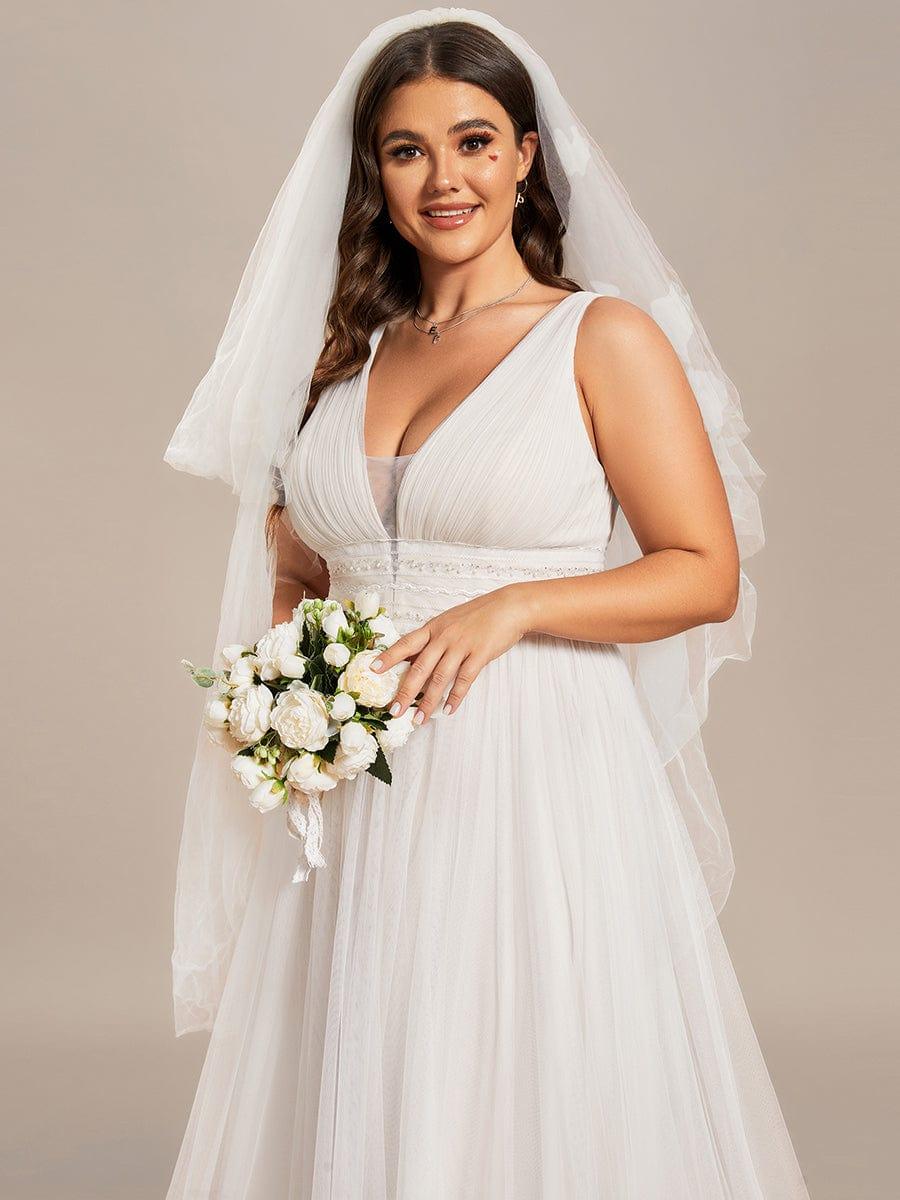 Women's V Neck Wedding Dress with Empire Waist and Flowing Maxi Skirt