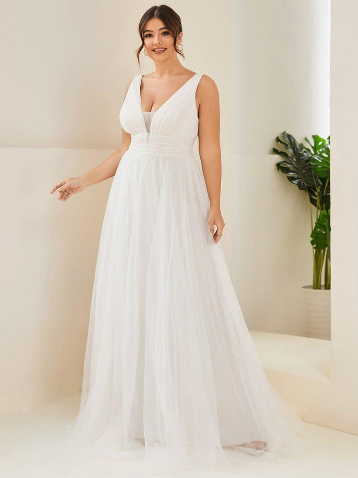 Women's V Neck Wedding Dress with Empire Waist and Flowing Maxi Skirt