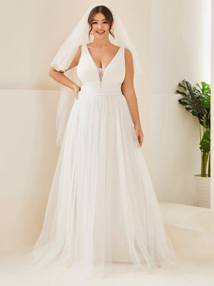 Women's V Neck Wedding Dress with Empire Waist and Flowing Maxi Skirt