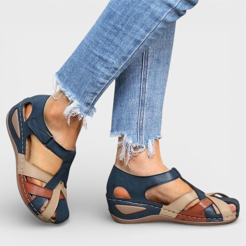 Women's Flat Sandals with Woven Straps and Closed Toe Design