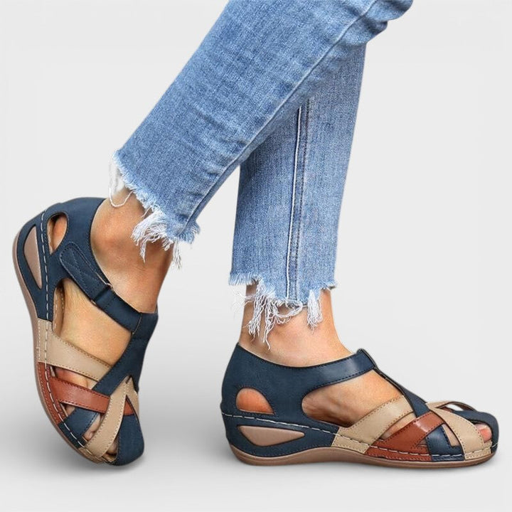 Women's Flat Sandals with Woven Straps and Closed Toe Design