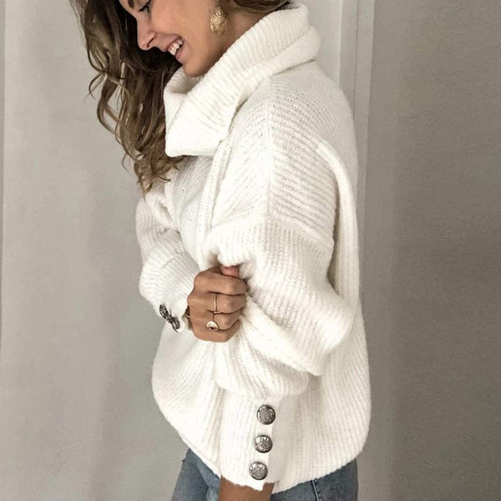 Women's Oversized Knitted Jumper with Roll Neck and Button Cuff Detail
