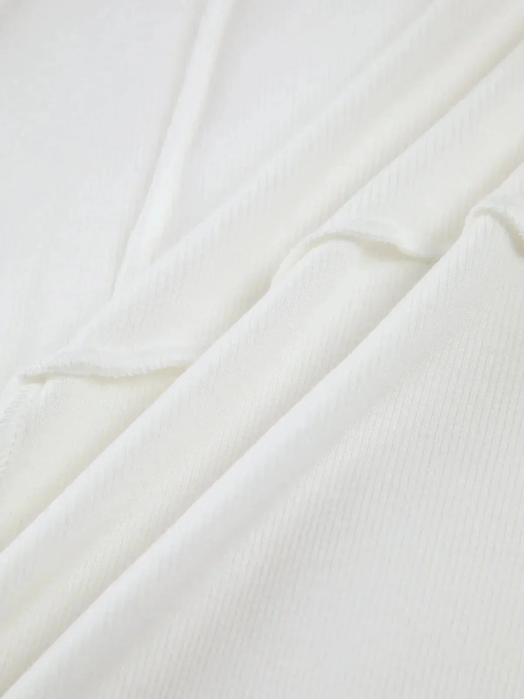 Women's Ribbed Top with Long Sleeves and Detailed Stitching