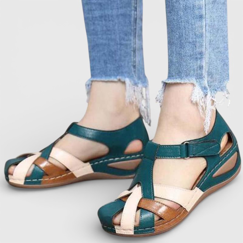 Women's Flat Sandals with Woven Straps and Closed Toe Design